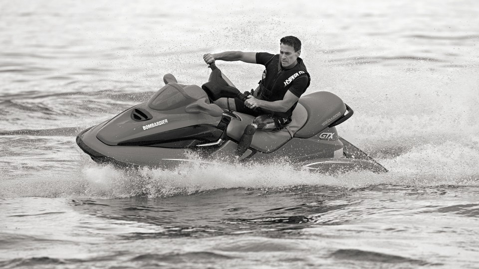 Andrew rides his jetski using the X3 waterproof prosthetic leg.