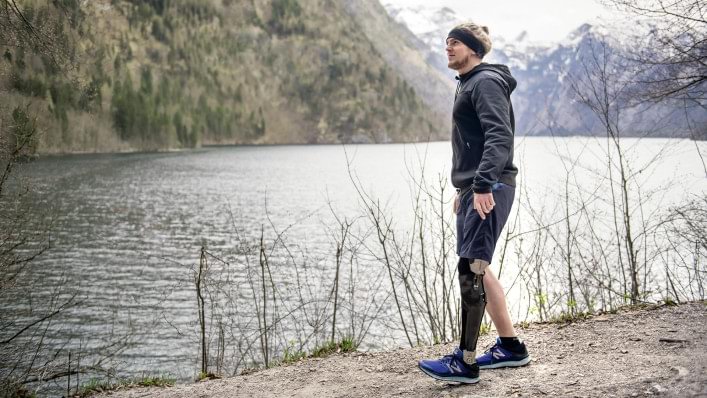 David walks along the lake with his C-Brace® KAFO system