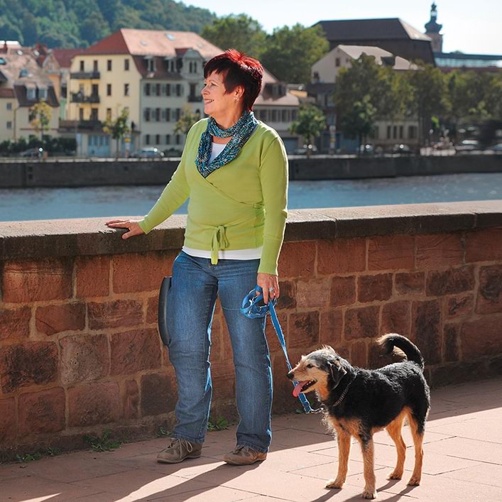 Karin wearing the C-Brace while walking her dog and enjoying the sites.
