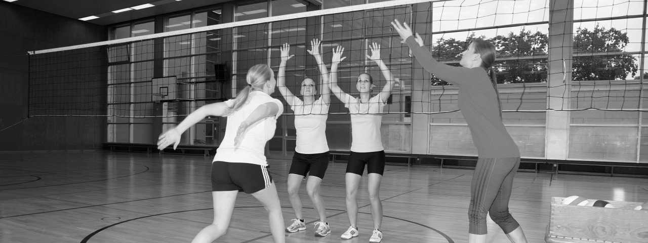 User Jana wears the Malleo TriStep ankle orthosis during volleyball training