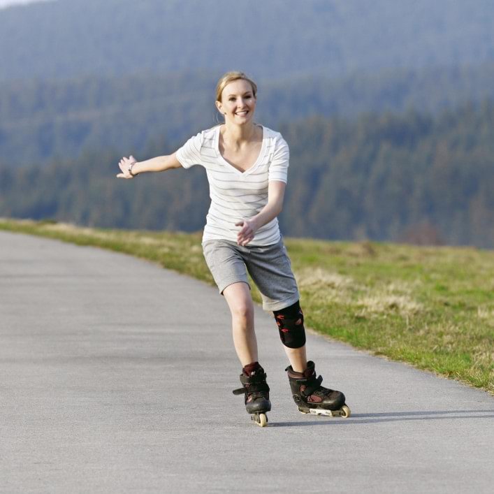 Judith with Patella Pro knee orthosis on rollerblades