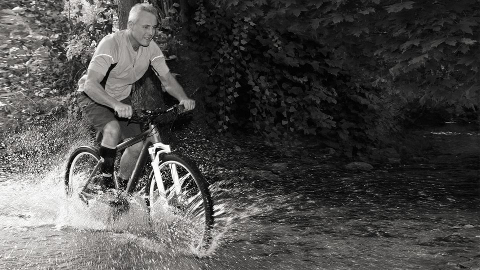 Henning riding a bike with WalkOn Reaction.