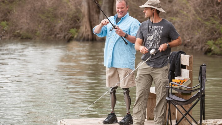 Bilateral Genium user Aaron goes fishing with his friend.