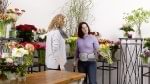 User Susanne wears the Lumbo Direxa back orthosis in her job as a florist