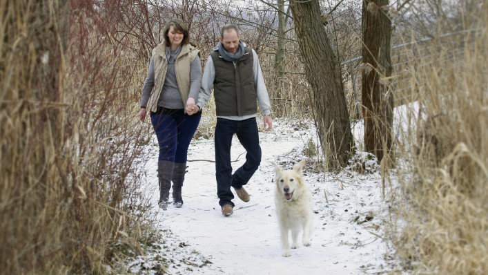 Jürgen with WalkOn foot drop splint taking a walk with his dog